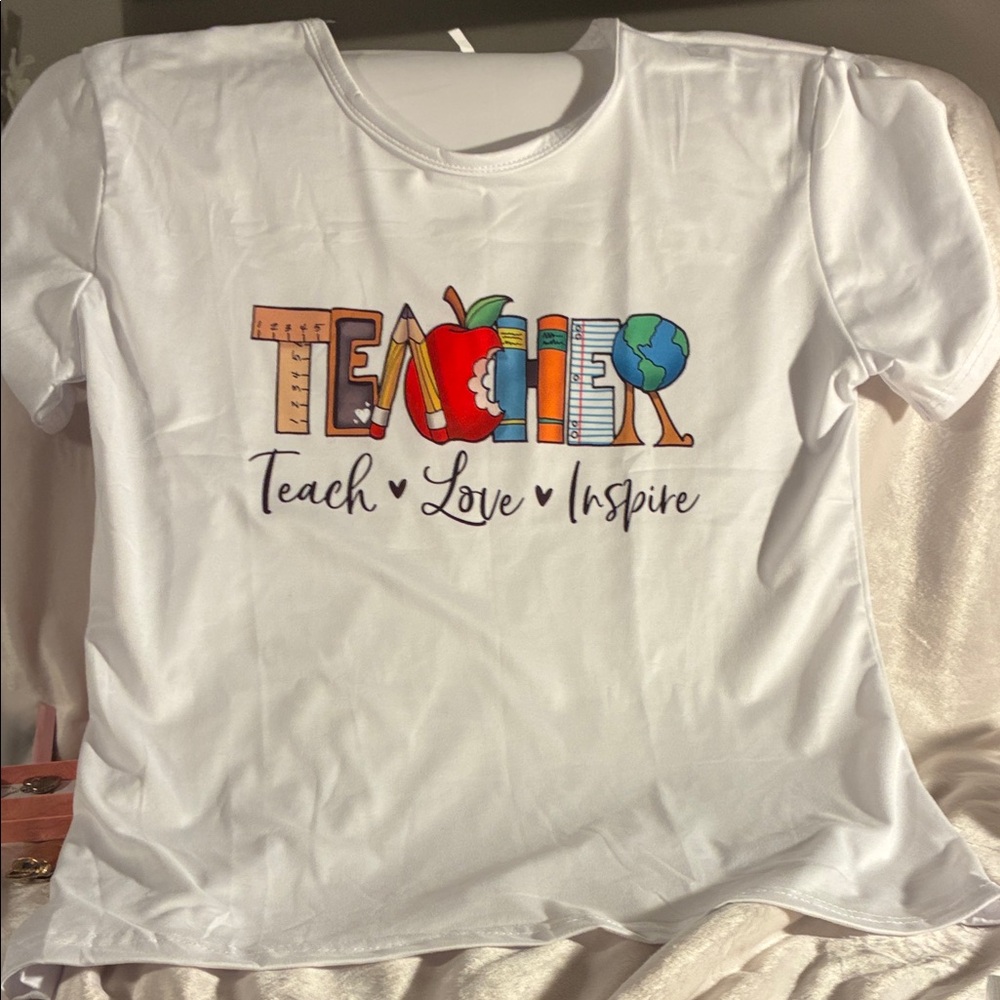 Teacher White Graphic Adult Shirt. It says XXL but fits more like a Medium